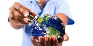 A doctor holding a stethoscope to the planet earth, symbolizing taking the pulse of the planet to monitor its health and well-being of our planet