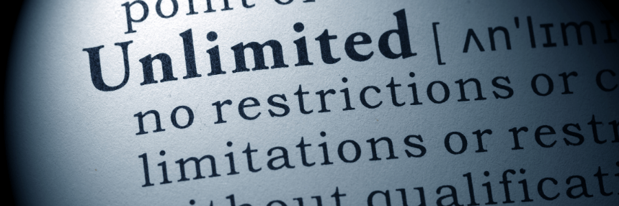 Close-up of the word ‘Unlimited’ in a dictionary, symbolizing the idea of unlimited love without restrictions or limitations