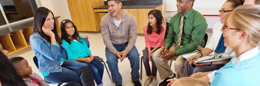 Students and teachers discussing community projects as part of what is planned giving education