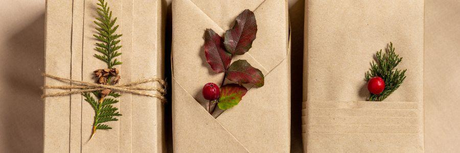 Christmas Wrapping Ideas using kraft paper, twine, and natural greenery for the true spirit of Christmas