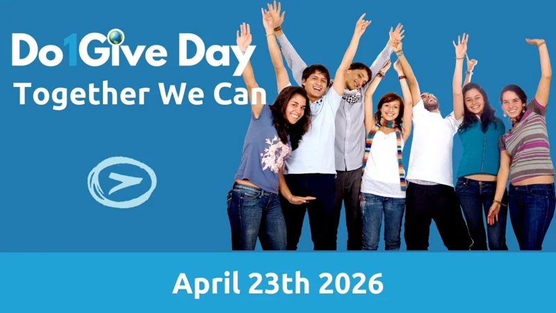 Excited young man and woman wearing white shirts, smiling and pointing upwards, promoting Do1Give Day Action Guide for high school clubs and youth leadership. The image encourages participation in the Day of Giving with the message ‘Just ONE..’ to inspire action.